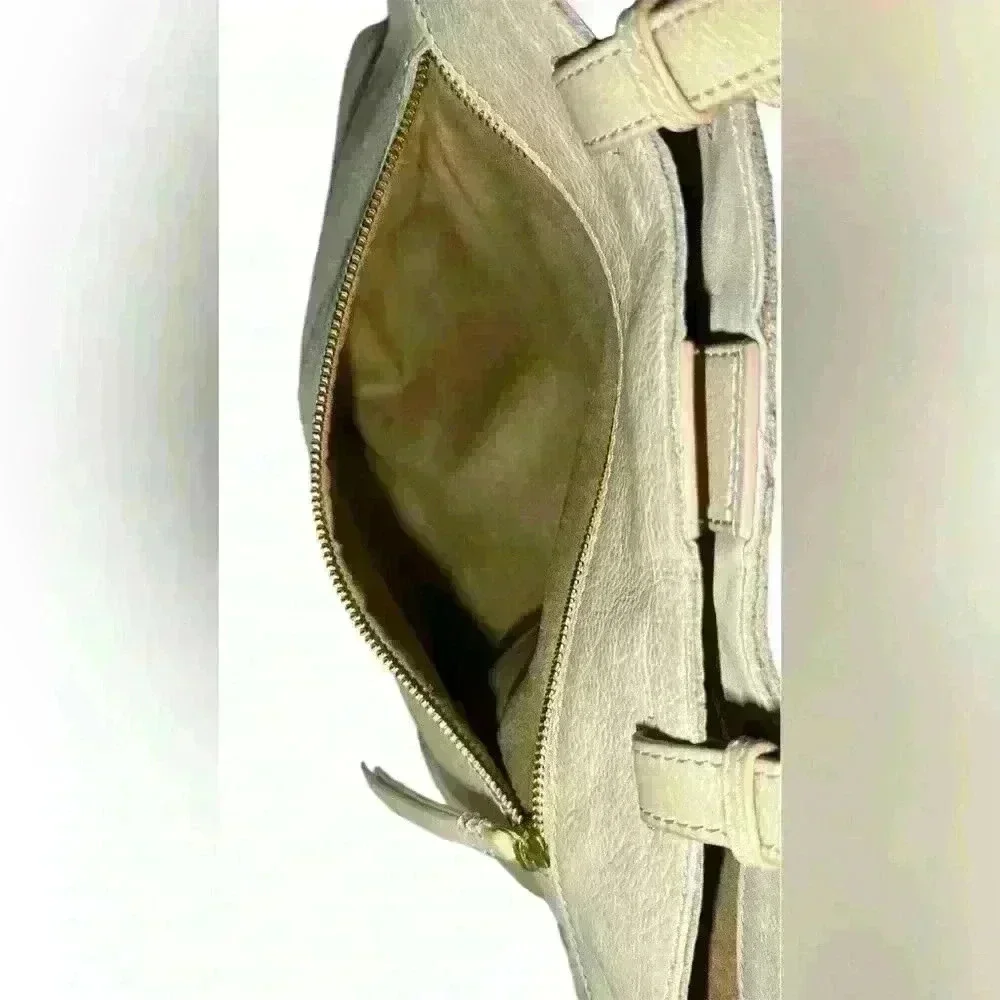 An American Leather Co. nude/cream colored leather woven tote bag.